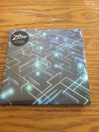 The Zutons - Creeping on the Dancefloor (7", Single, Ltd, Blu) (M / M) - Image 2